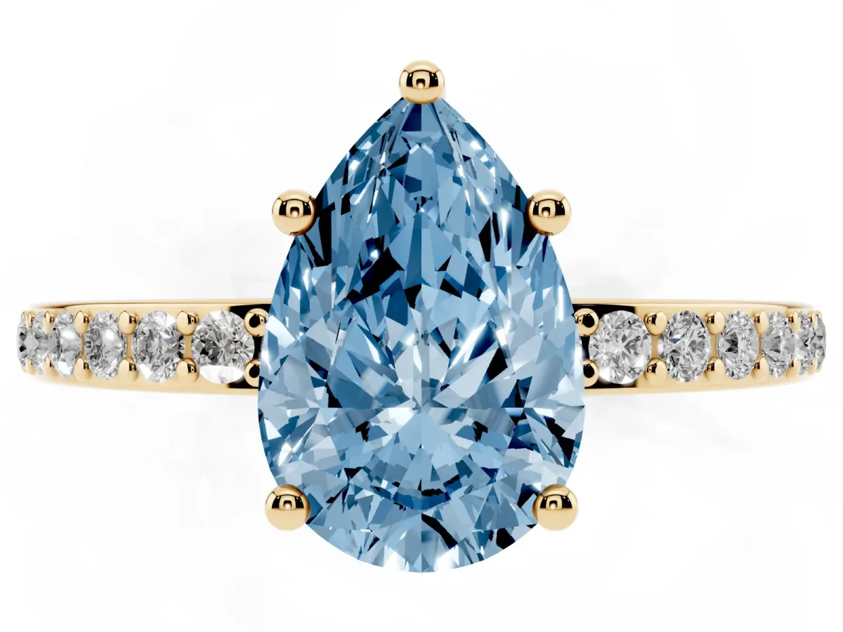 Fancy Blue Pear Cut Cut Diamond Pavé Band Ring with Four-Prong Setting Yellow gold