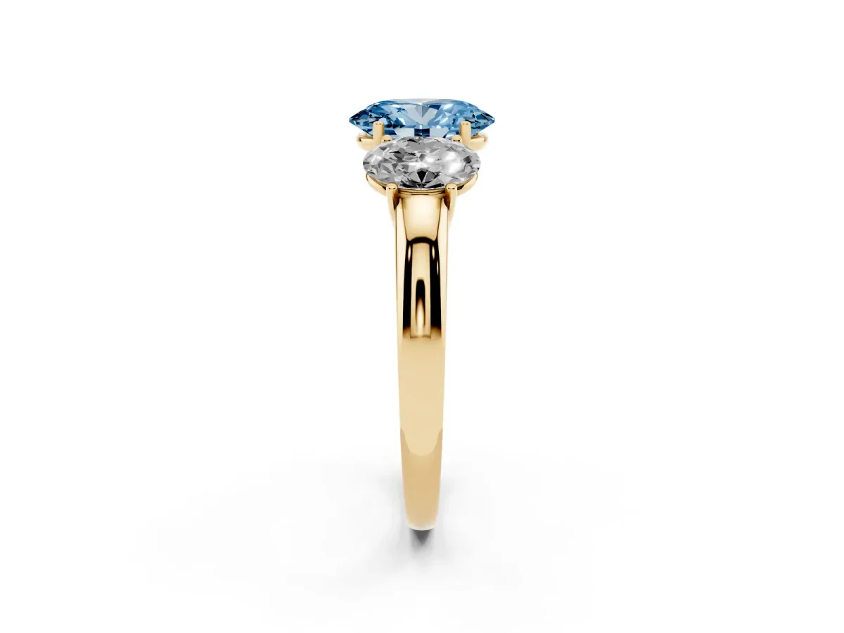 Fancy Blue Oval Cut Diamond Three-Stone Ring with Four-Prong Setting and Classic Band Yellow gold