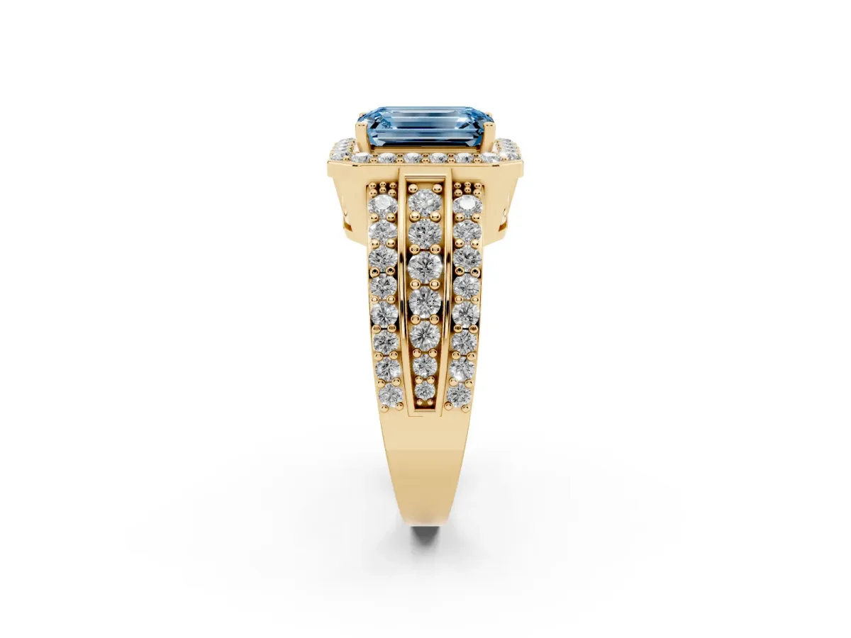 Fancy Blue Emerald Cut Halo Diamond Ring with Round Split Shank and Prong Setting Yellow gold