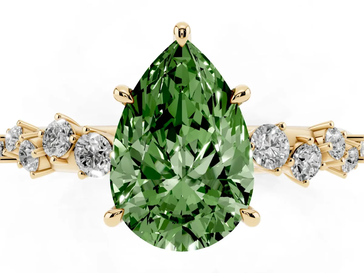 Fancy Green Pear Cut Diamond Cluster Side Stone Solitaire Ring with Prong Setting Yellow gold