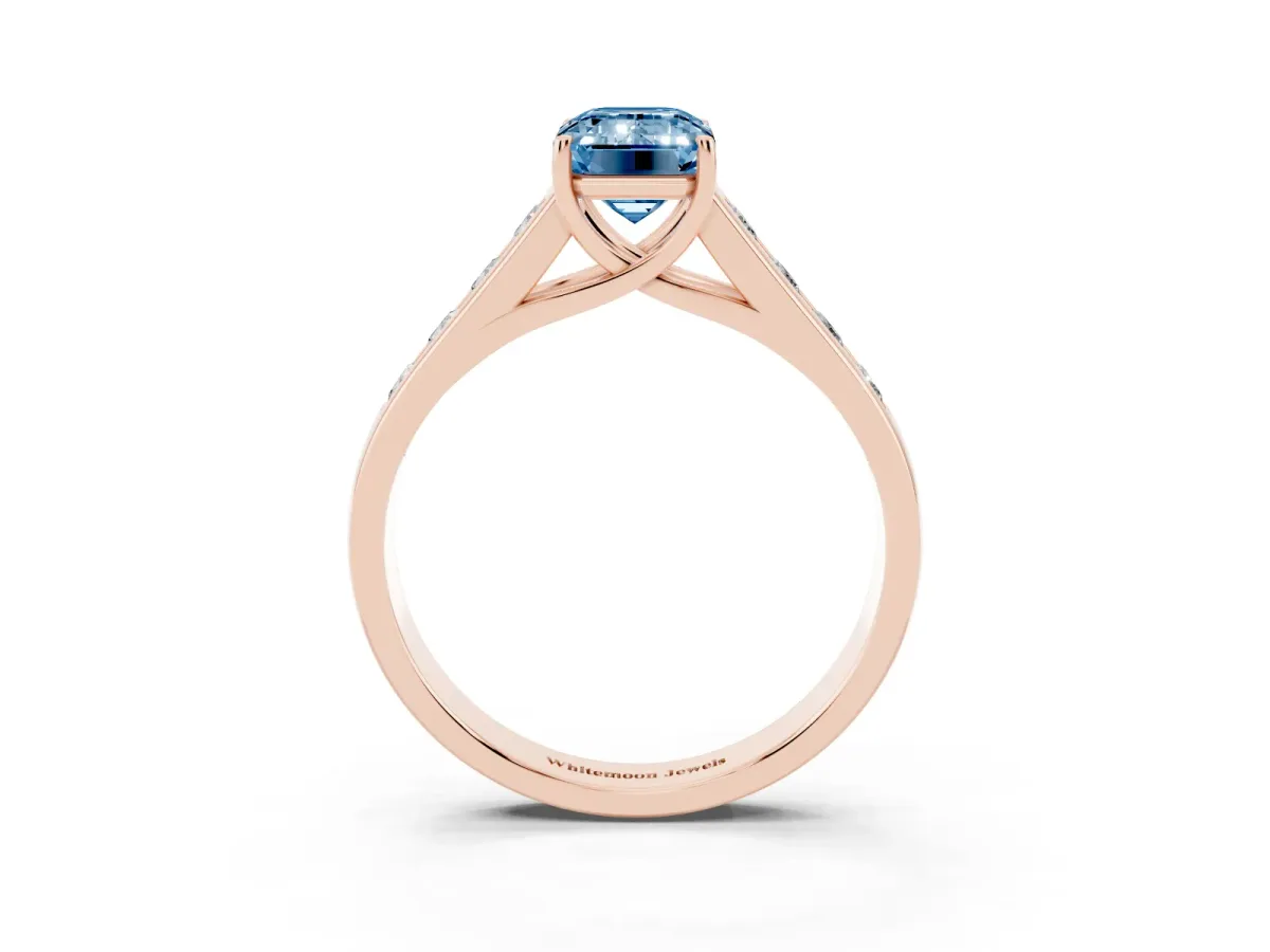 Fancy Blue Emerald Cut Solitaire Channel-Set Diamond Engagement Ring with Four-Prong Setting Rose gold