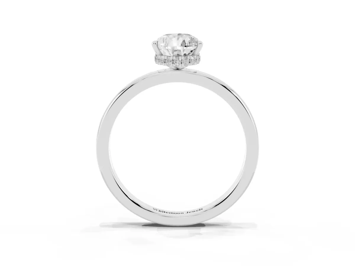 Pear Cut Solitaire Engagement Ring with Cathedral Band and Four-Prong Setting Silver