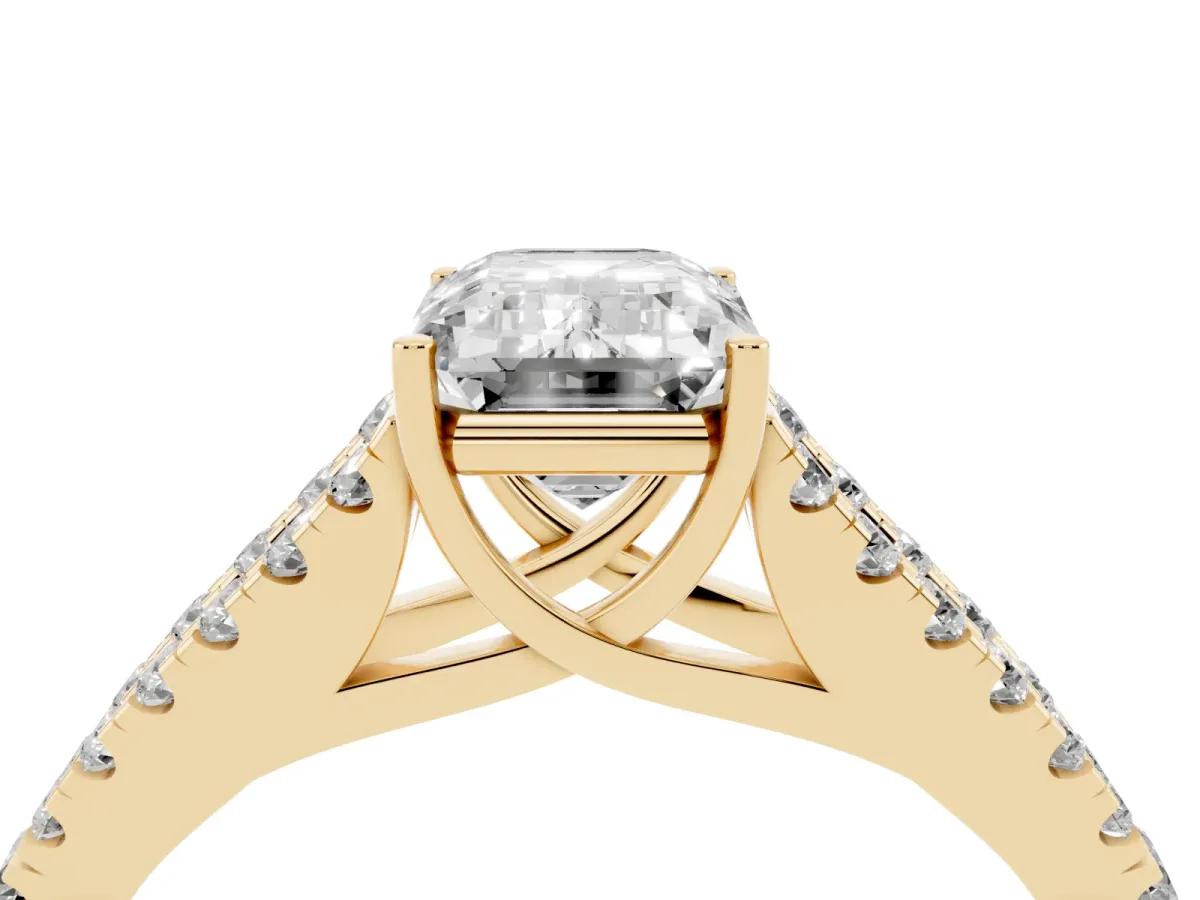 Emerald Cut Diamond Split Shank Pavé Engagement Ring with Four-Prong Setting Yellow gold