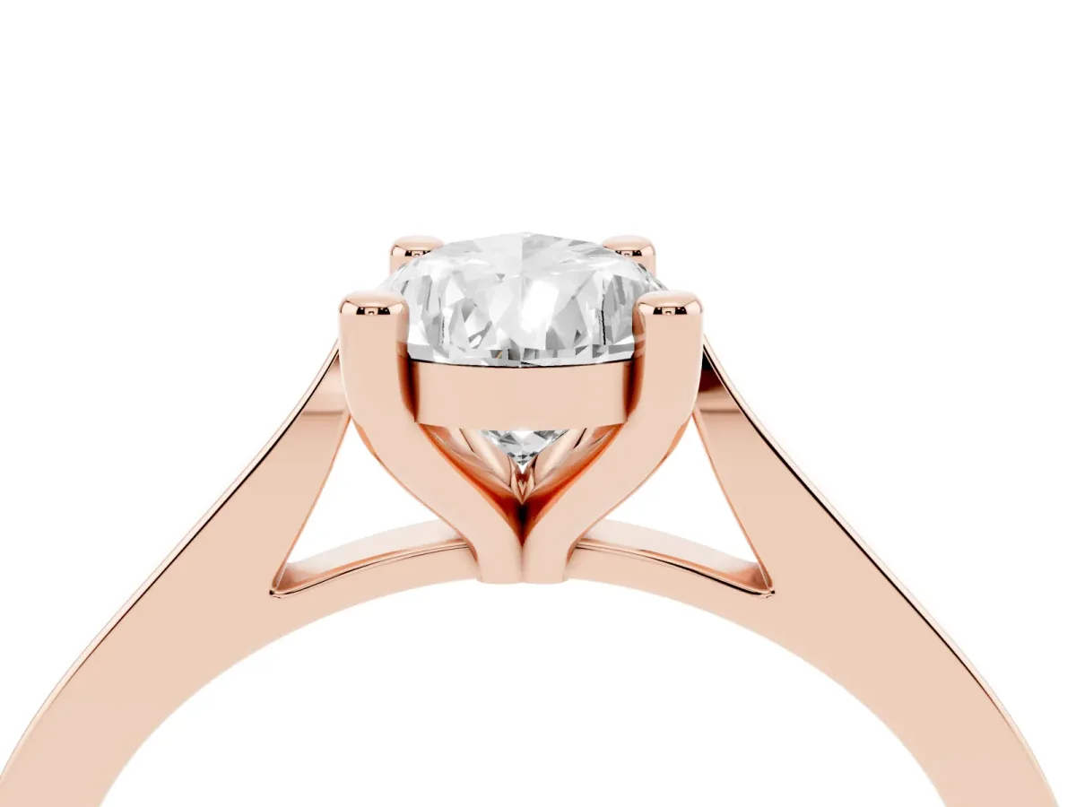 Pear Cut Solitaire Diamond Ring with Four-Prong Setting and Tapered Band Rose gold