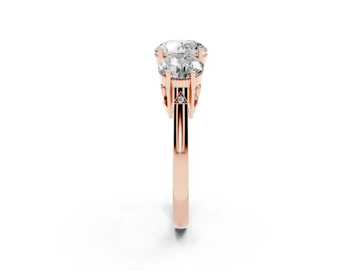 Three-Stone Round Cut Diamond Engagement Ring with Prong Setting on a Classic Band Rose gold