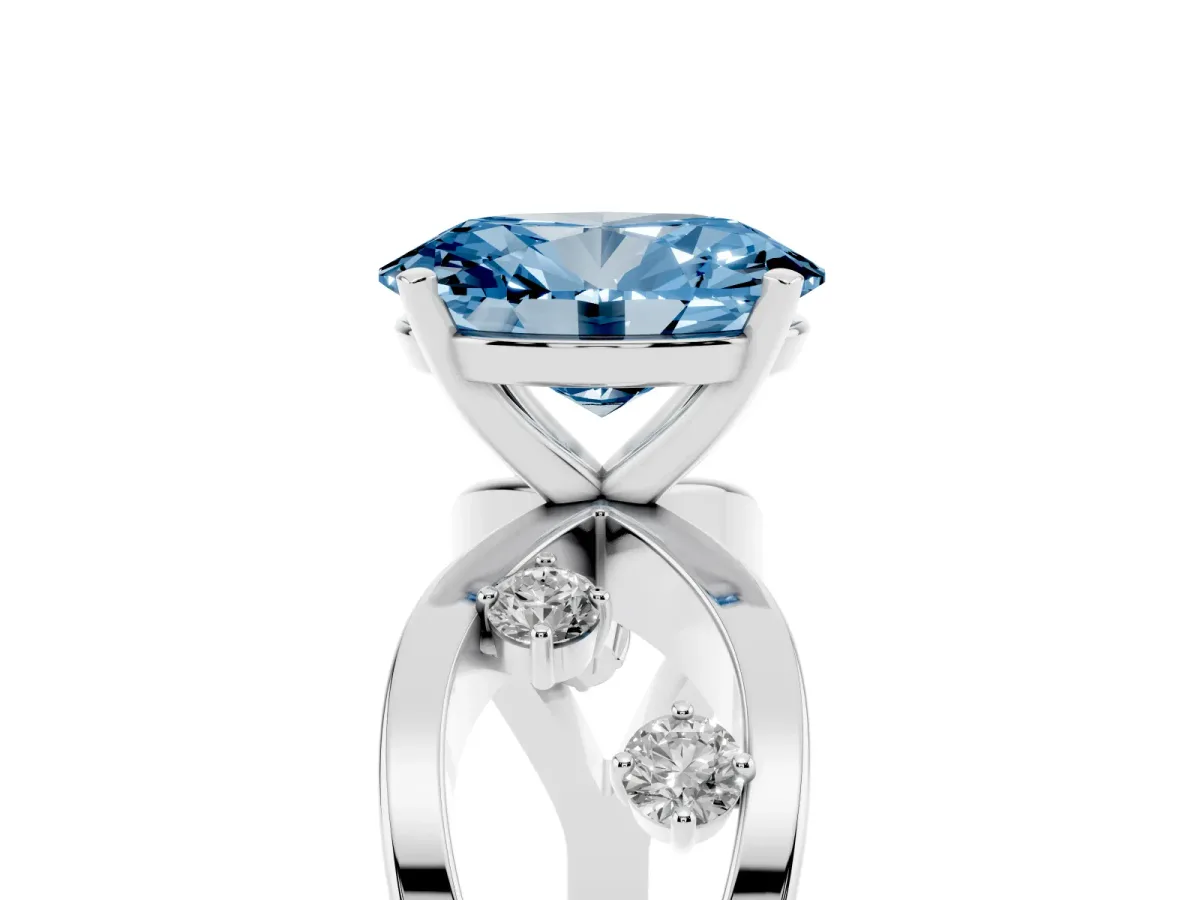 Fancy Blue Oval Cut Cut Solitaire Diamond with Side Stones on Criss-Cross Band and Four-Prong Setting Silver