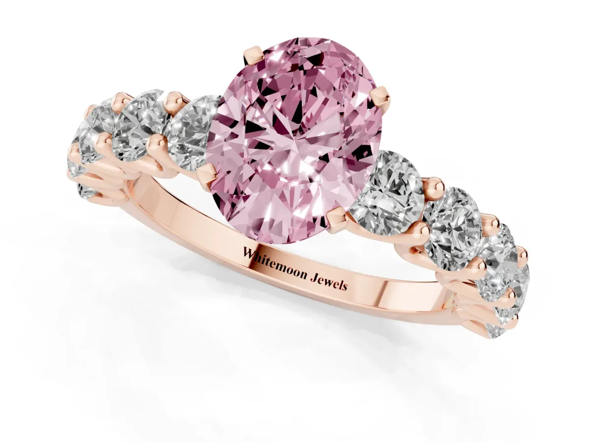 Fancy Pink Oval Cut Diamond Prong Setting with Side Stones on a Pave Band Rose gold