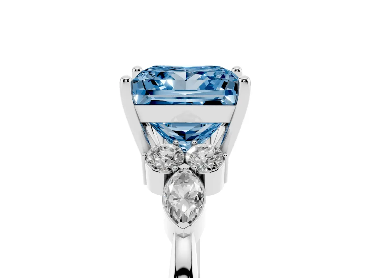 Fancy Blue Princess Cut Brilliant Diamond Solitaire Ring with Pear Side Stones and Four-Prong Setting Silver
