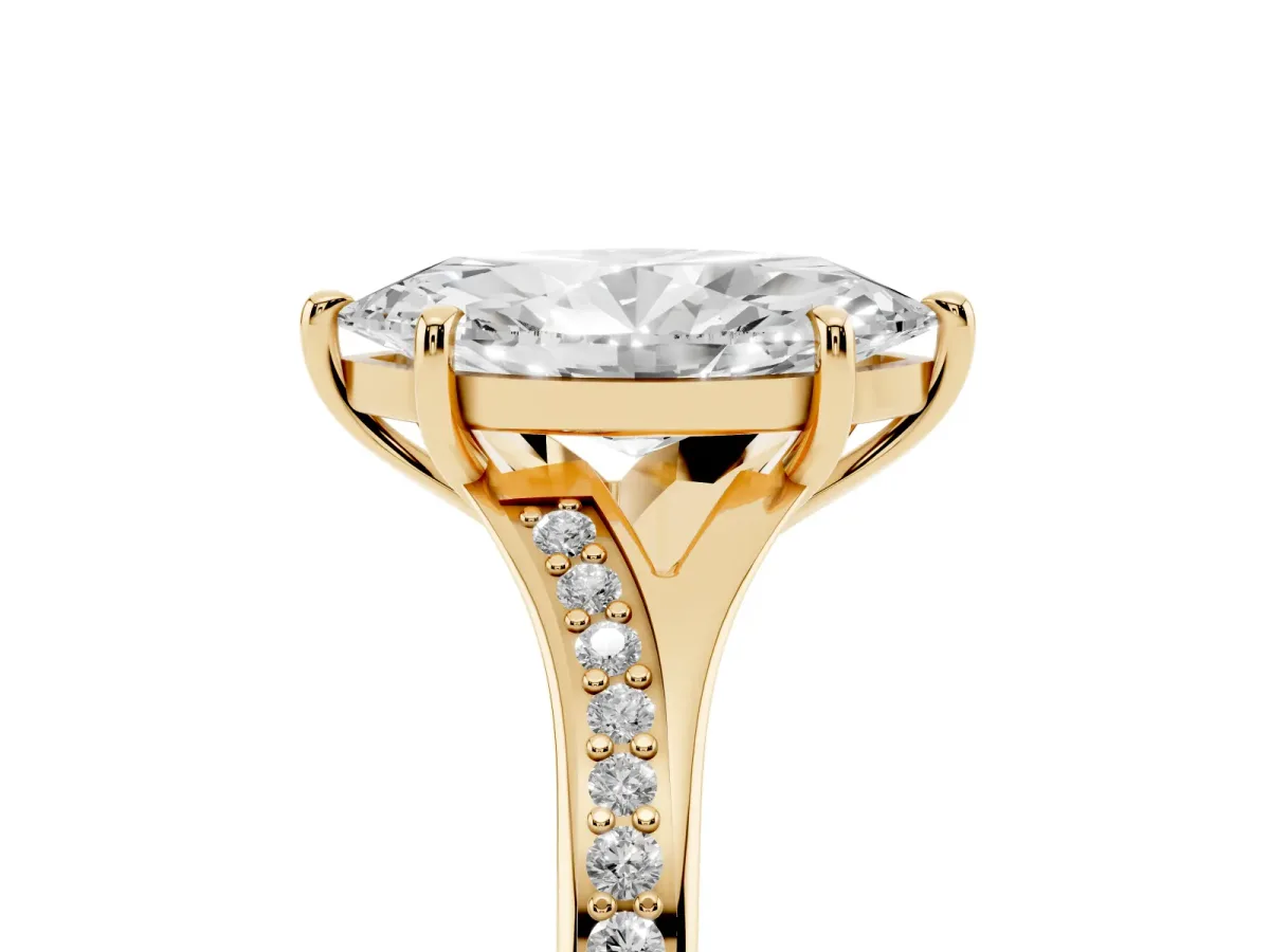 Marquise Cut Diamond Solitaire Ring with Pavé Band and Prong Setting Yellow gold