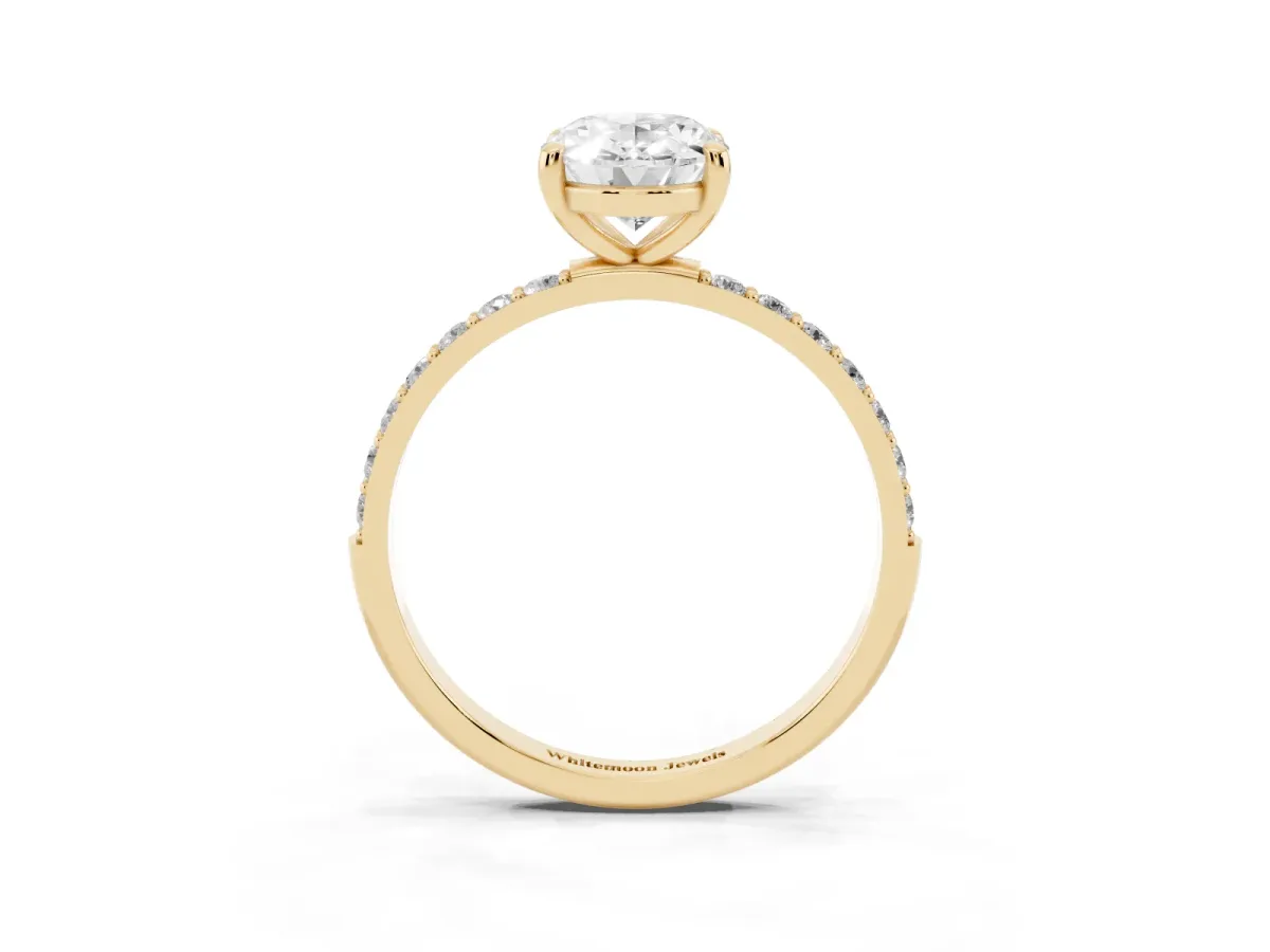 Oval Cut Diamond Solitaire Ring with Round Pavé Band and Prong Setting Yellow gold