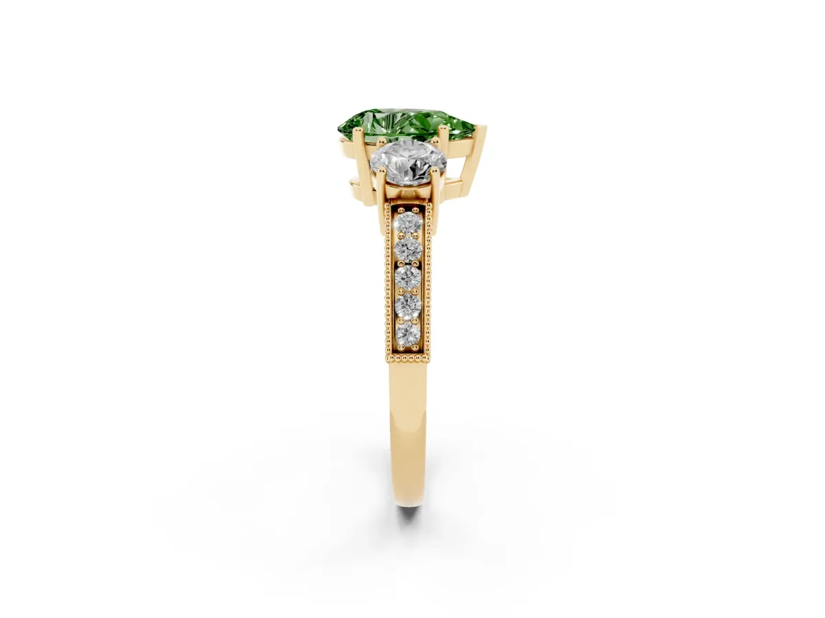Fancy Green Pear Cut Three-Stone Diamond Ring with Pavé Band and Four-Prong Setting Yellow gold
