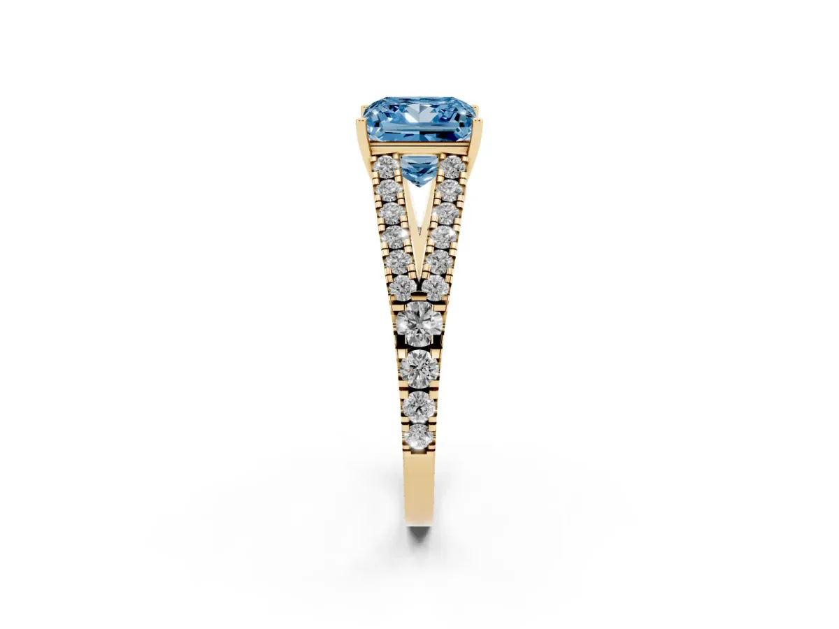 Fancy Blue Princess Cut Diamond Split Shank Engagement Ring with Round Pavé and Prong Setting Yellow gold