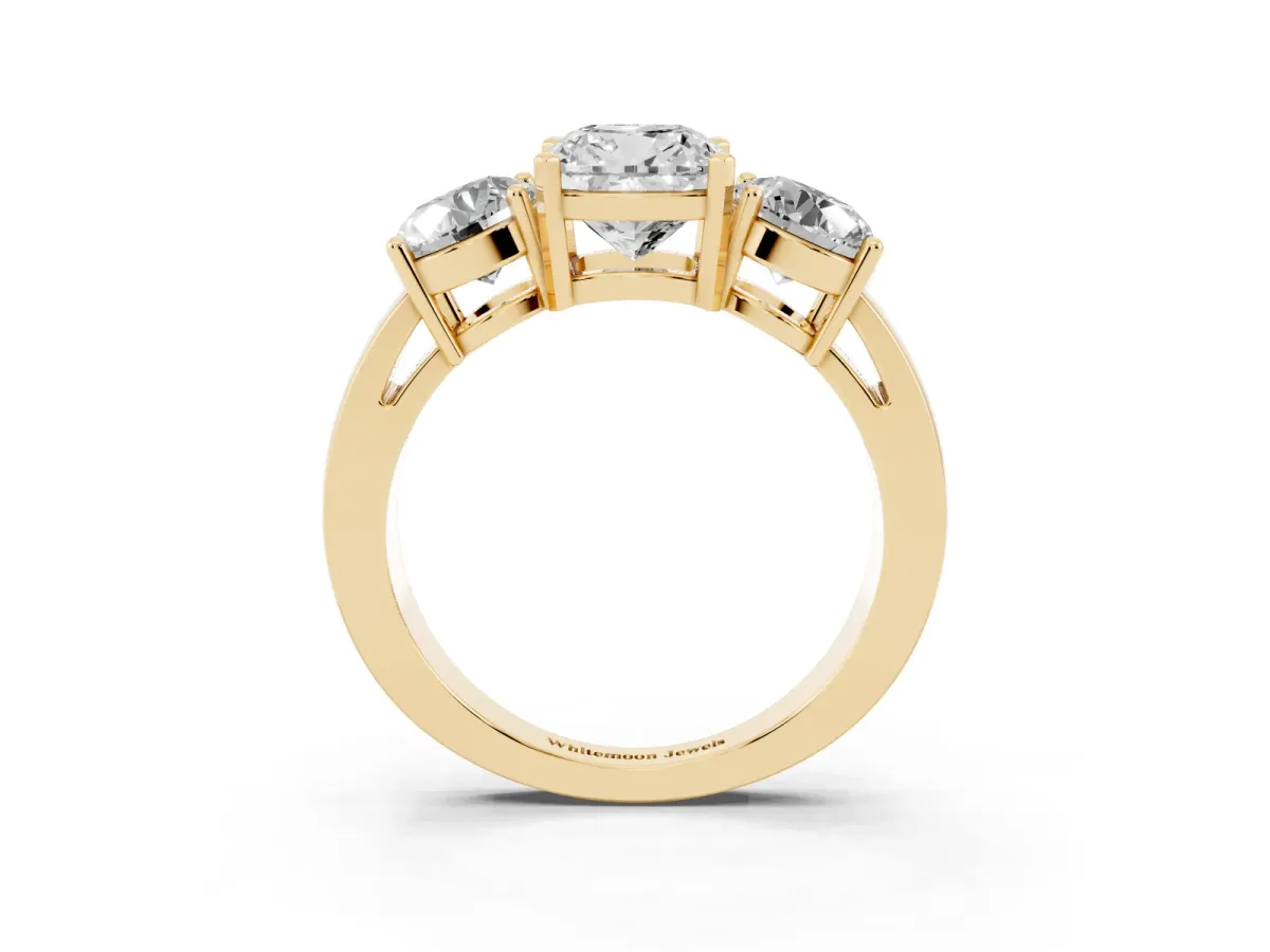 Three-Stone Cushion Cut Diamond Ring with Round Side Stones, Classic Band, and Four-Prong Setting Yellow gold