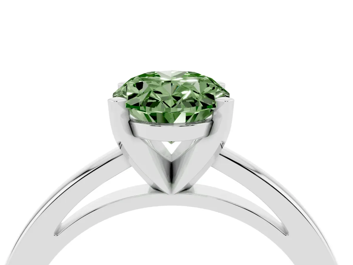 Fancy Green Oval Cut Solitaire Diamond Engagement Ring with Four-Prong Setting on a Classic Band Silver