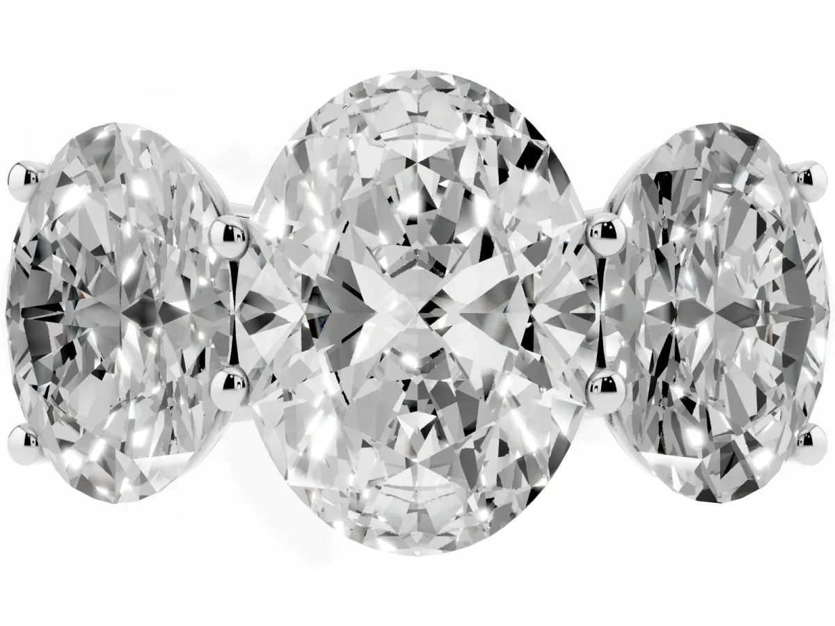 Oval Cut Three-Stone Diamond Ring with Prong Setting on a Classic Band Silver