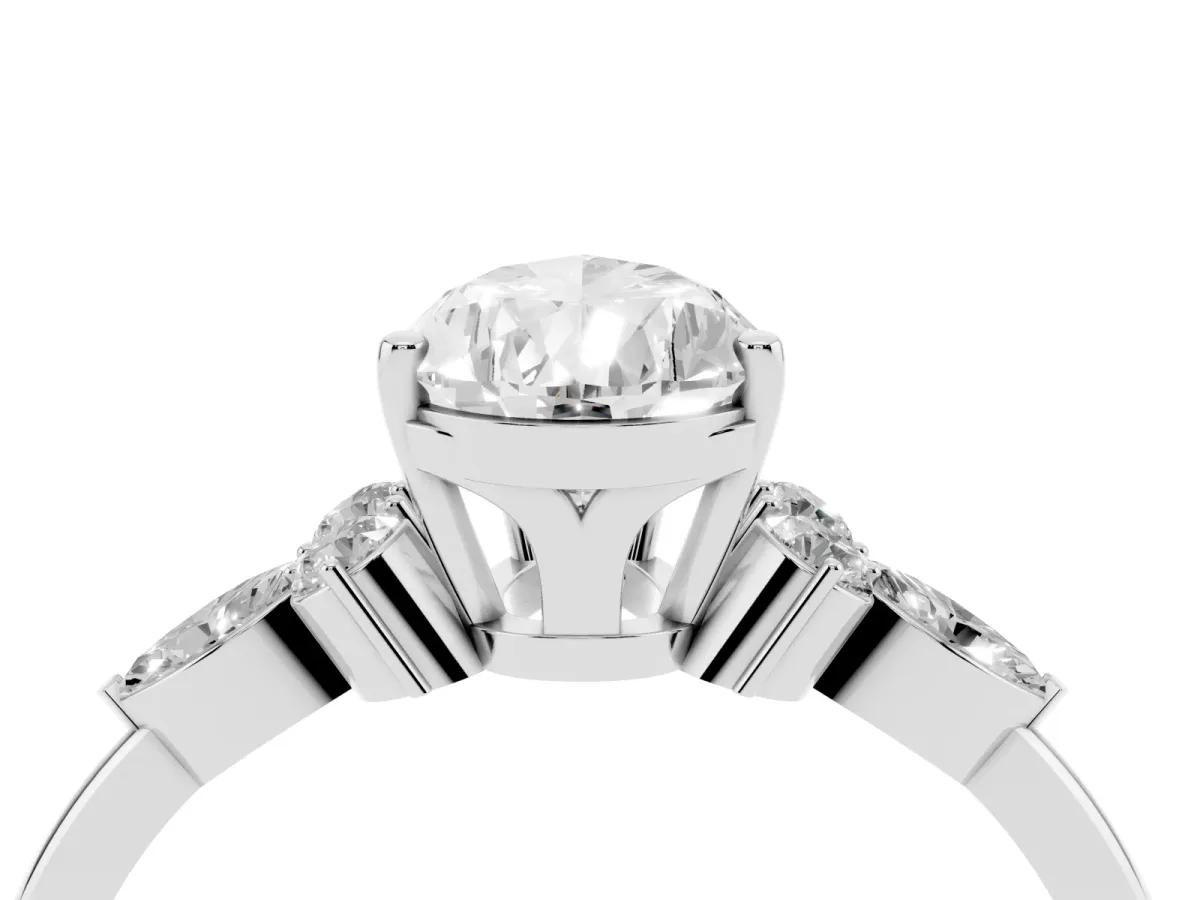 Pear Cut Brilliant Diamond Solitaire Ring with Pear Side Stones and Four-Prong Setting Silver