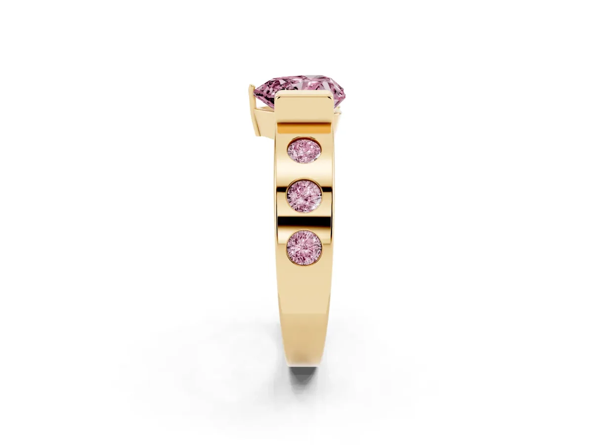 Fancy Pink Heart Cut Brilliant Channel-Set Diamond Ring with Bezel Prong Setting Yellow gold