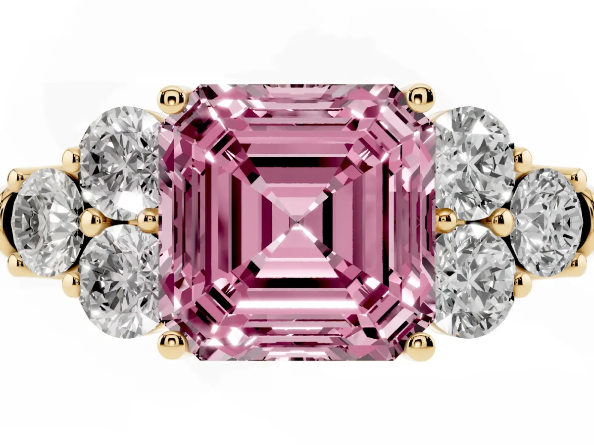 Fancy Pink Asscher Cut Cut Diamond Cluster Ring with Round Accent Stones and Prong Setting on a Classic Band Yellow gold