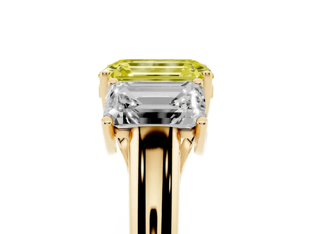 Fancy Yellow Three-Stone Emerald Cut Diamond Engagement Ring with Prong Setting Yellow gold