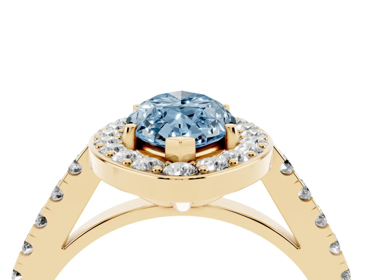 Fancy Blue Marquise Cut Diamond Halo Ring with Round Pavé Split Shank and Prong Setting Yellow gold