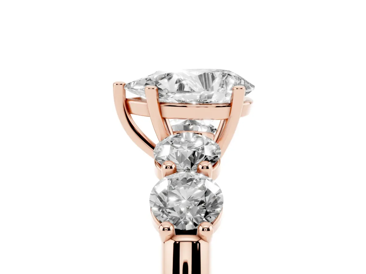 Pear Cut Cut Five-Stone Prong Set Diamond Ring with Classic Band Rose gold