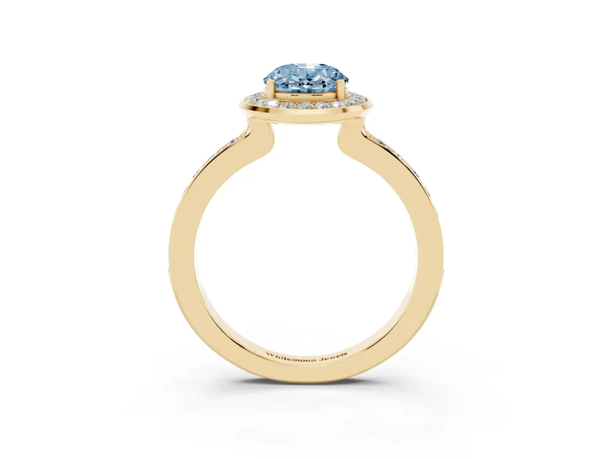 Fancy Blue Oval Cut Diamond Halo Ring with Bezel Frame and Pavé Band Yellow gold