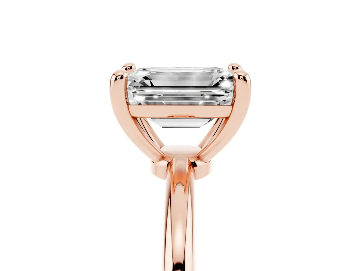 Emerald Cut Solitaire Diamond Ring with 4-Prong Setting on a Classic Band Rose gold