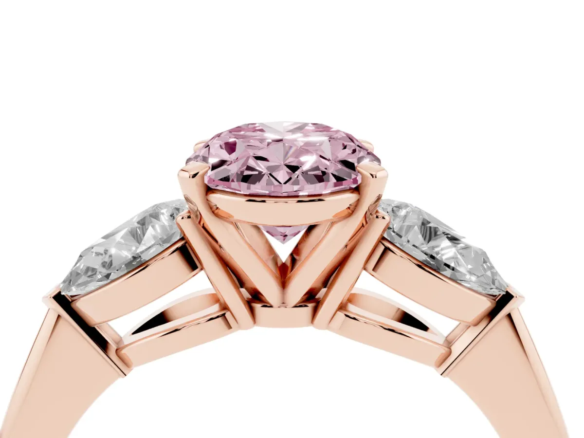 Fancy Pink Three-Stone Oval Cut Diamond Ring with Pear Side Stones and Four-Prong Setting Rose gold