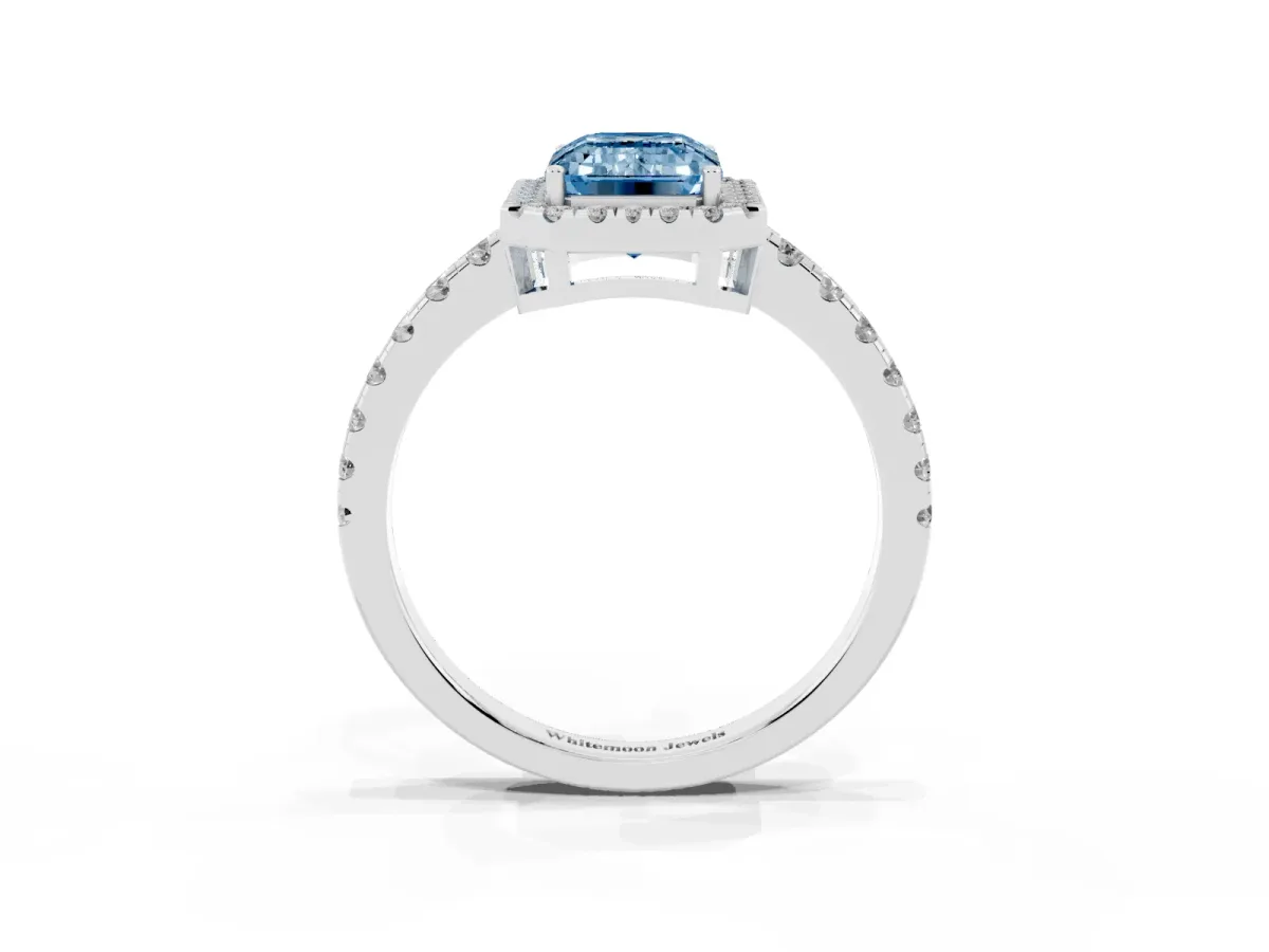 Fancy Blue Emerald Cut Diamond Halo Ring with Pavé Band and Four-Prong Setting White gold