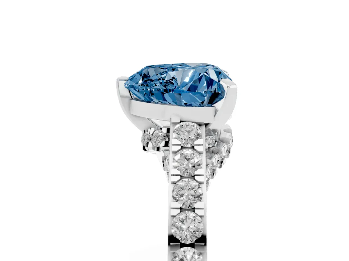 Fancy Blue Heart Cut Diamond Solitaire Ring with Crossover Gallery and Round Pavé Band Platinum