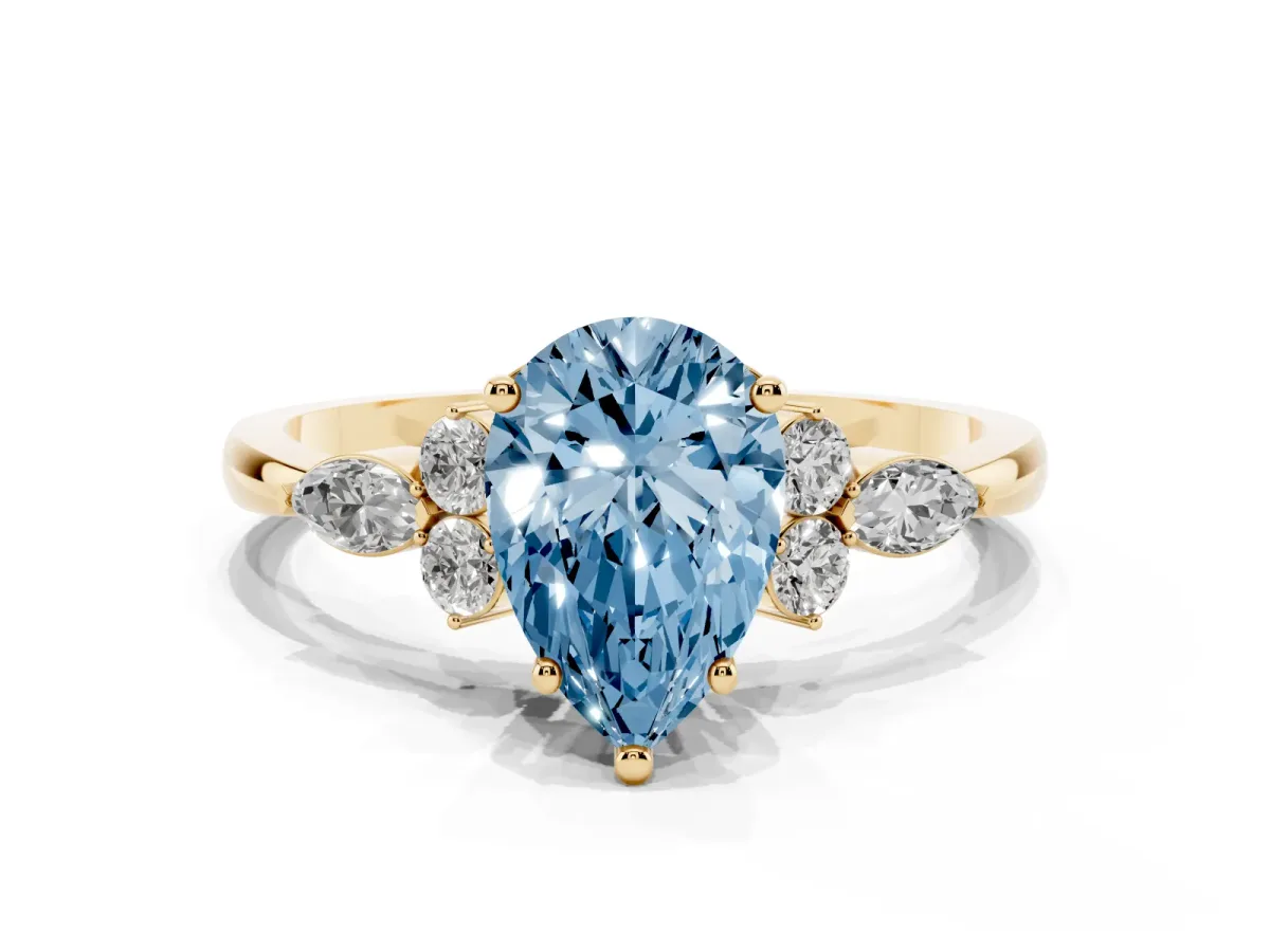Fancy Blue Pear Cut Brilliant Diamond Solitaire Ring with Pear Side Stones and Four-Prong Setting Yellow gold