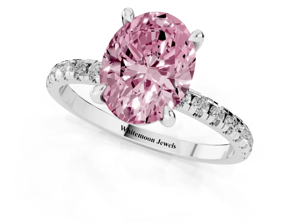 Fancy Pink Oval Cut Diamond Brilliant Solitaire Ring with Pavé Band and Four-Prong Setting Silver