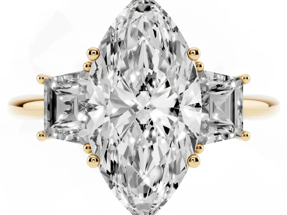 Marquise Cut Diamond Three-Stone Ring with Trapezoid Side Stones and Prong Setting Yellow gold