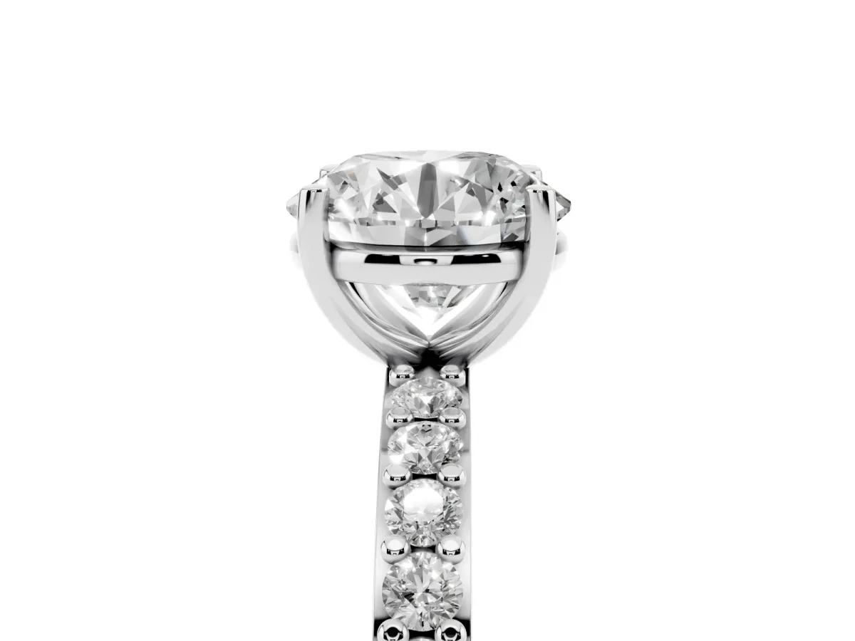 Round Cut Cut Diamond Solitaire with Pave Band and Four-Prong Setting Silver