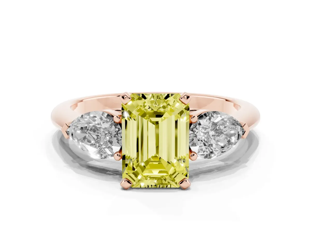 Fancy Yellow Three-Stone Emerald Cut Diamond Ring with Pear Side Stones and Four-Prong Setting Rose gold