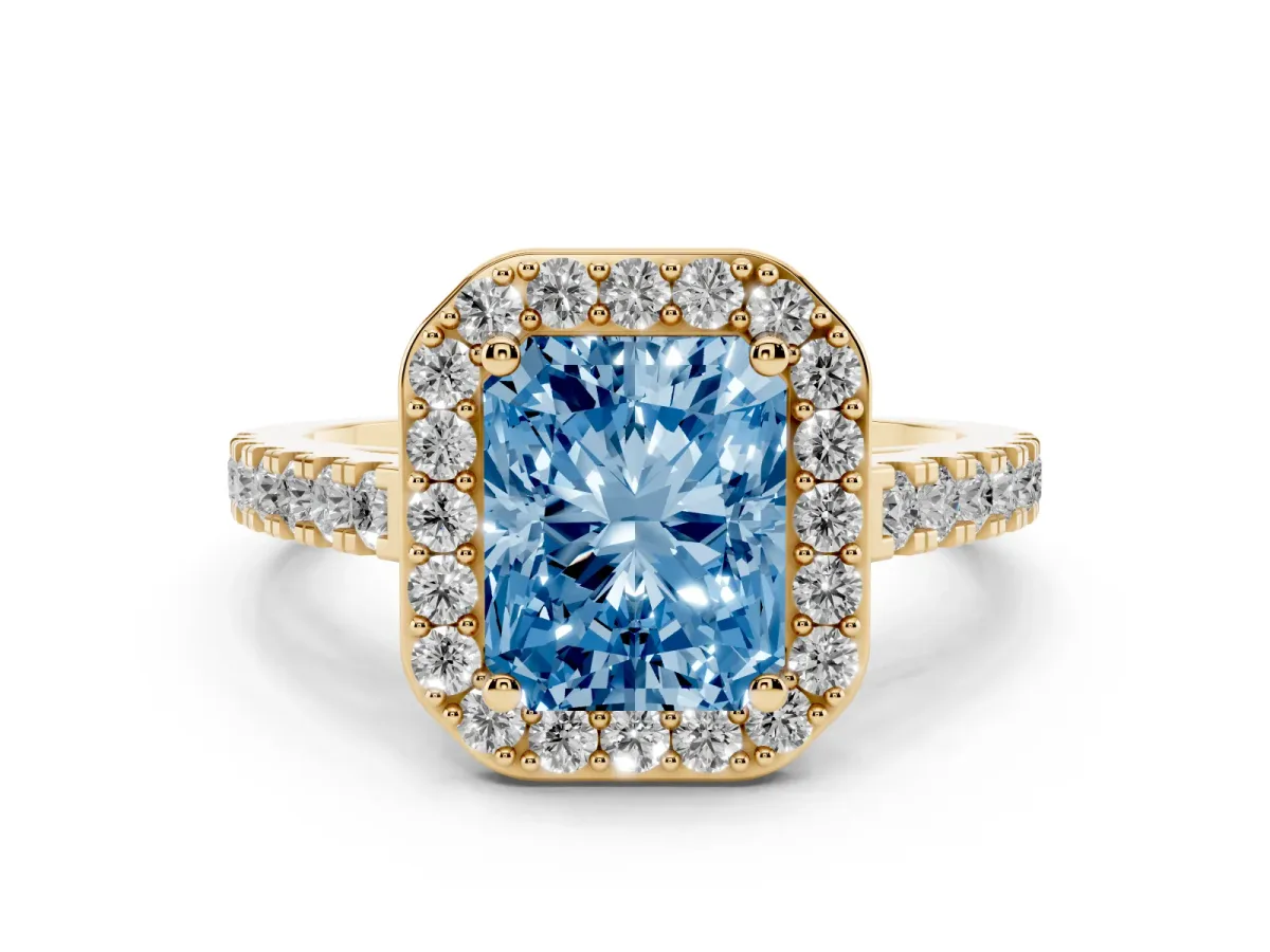 Fancy Blue Radiant Cut Diamond Halo Ring with Round Pavé Split Shank and Prong Setting Yellow gold