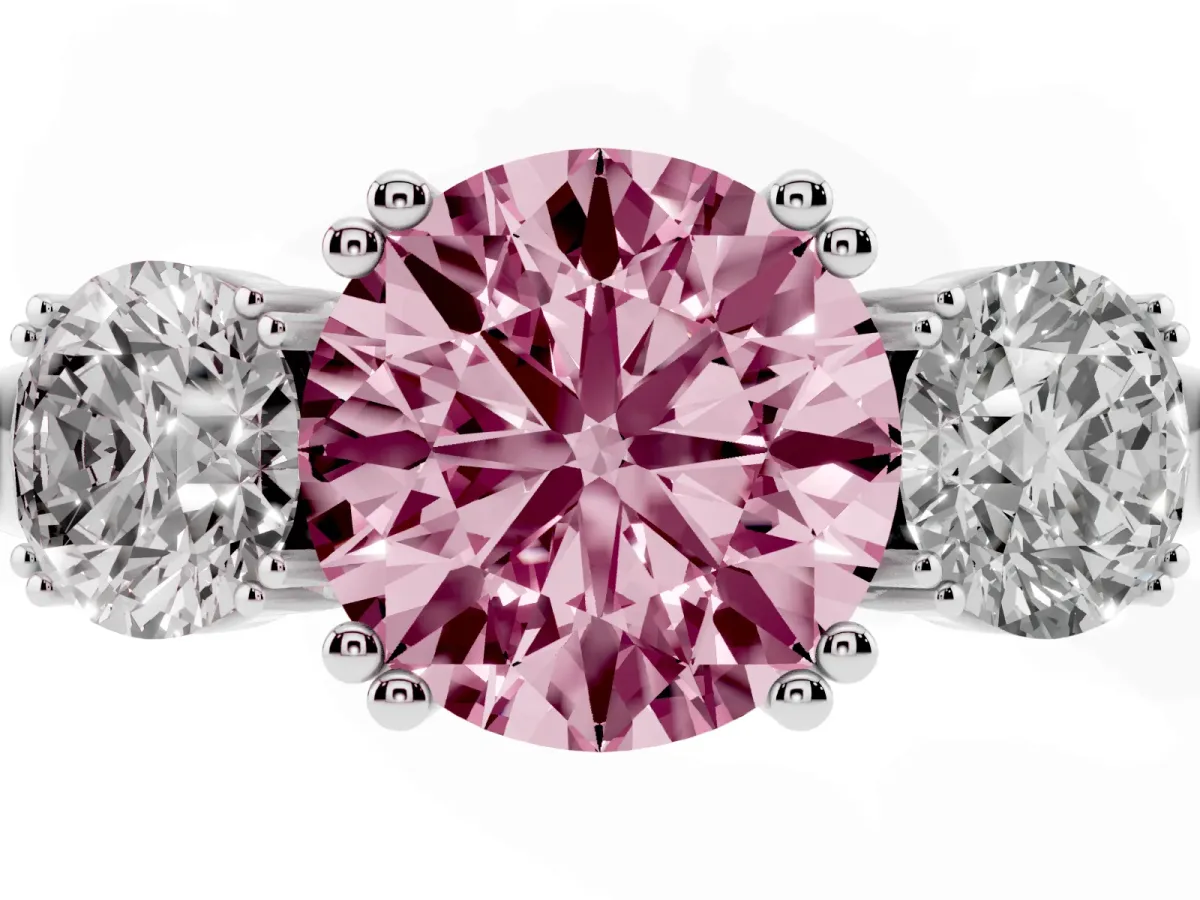 Fancy Pink Three-Stone Round Cut Cut Diamond Ring with Channel Set Band and Four-Prong Setting Silver