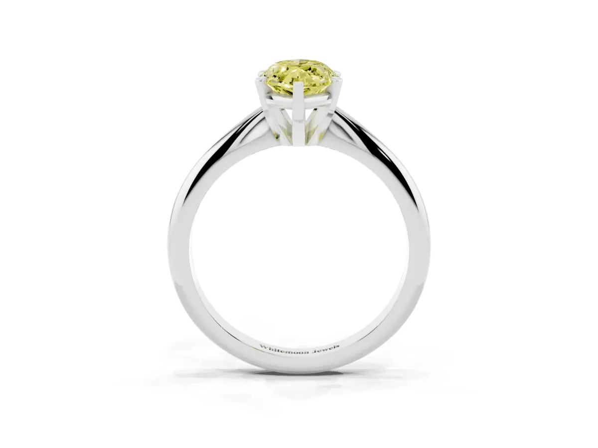 Fancy Yellow Marquise Cut Cut Solitaire Ring with Four-Prong Setting on a Classic Band Platinum