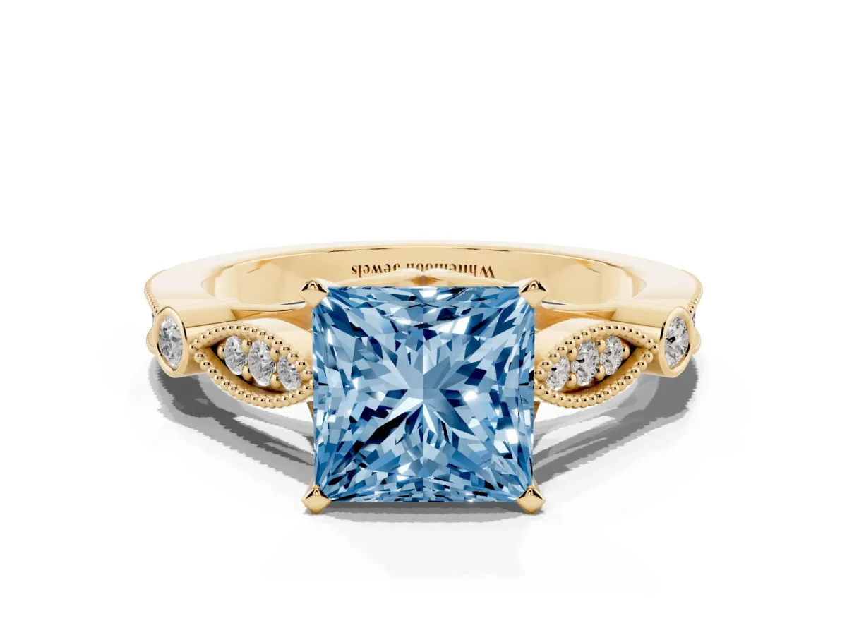 Fancy Blue Princess Cut Cut Diamond with Milgrain Marquise and Bezel Accents on a Solitaire Band with Prong Setting Yellow gold