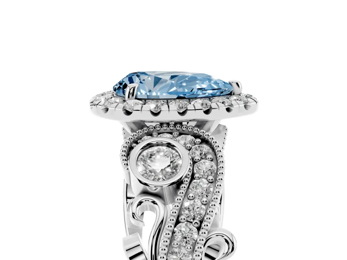 Fancy Blue Pear Cut Diamond Halo Ring with Milgrain Pavé Band and Four-Prong Setting Silver