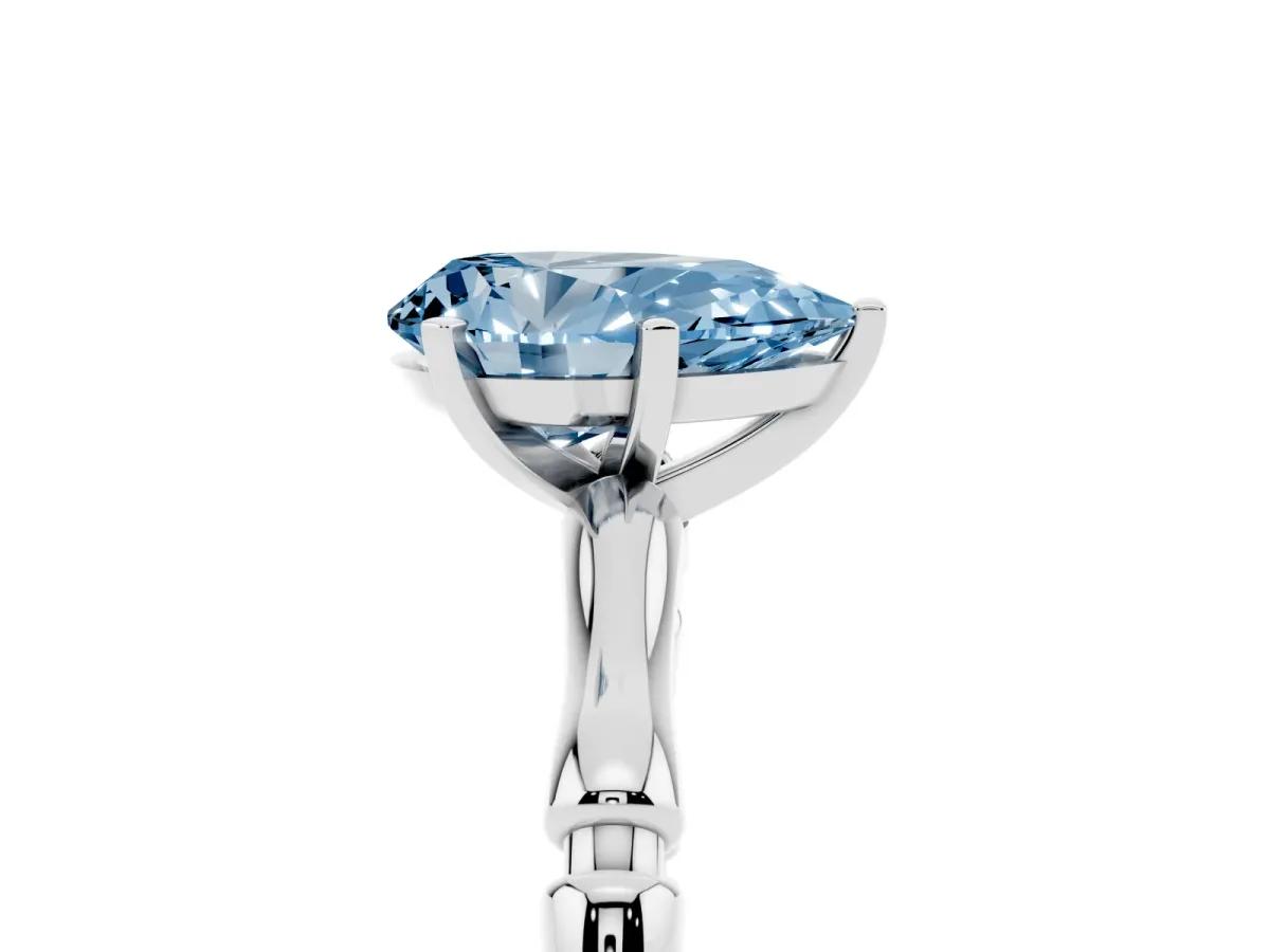 Fancy Blue Pear Cut Solitaire Diamond Ring with Bamboo Band and Four-Prong Setting Platinum
