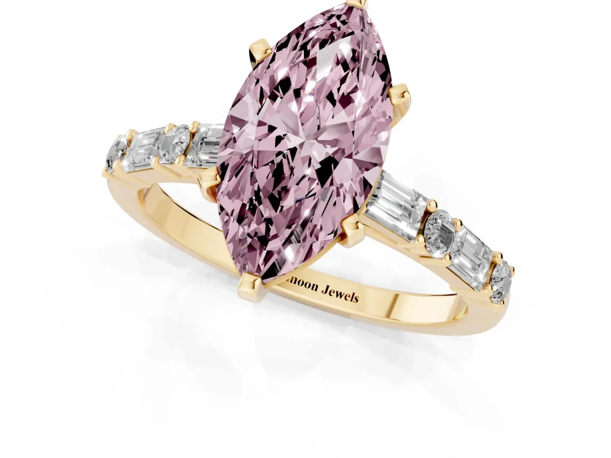 Fancy Pink Marquise Cut Diamond Solitaire with Side Baguettes and Channel Set Band Yellow gold
