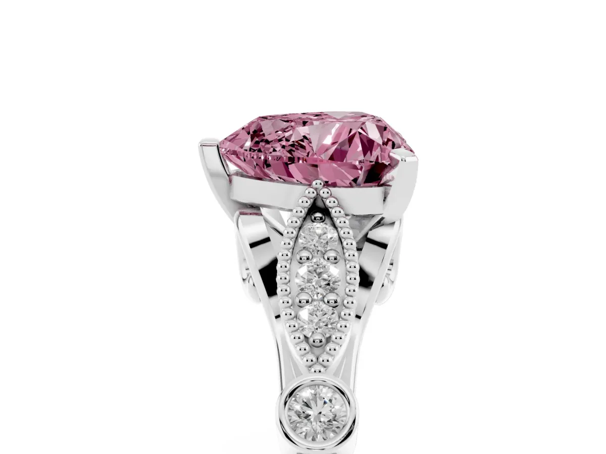 Fancy Pink Heart Cut Cut Diamond with Milgrain Marquise and Bezel Accents on a Solitaire Band with Prong Setting Platinum