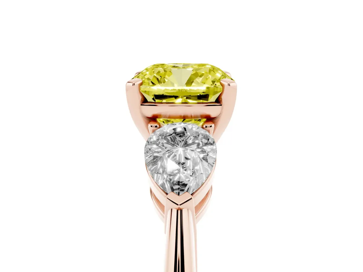 Fancy Yellow Three-Stone Cushion Cut Diamond Ring with Pear Side Stones and Four-Prong Setting Rose gold