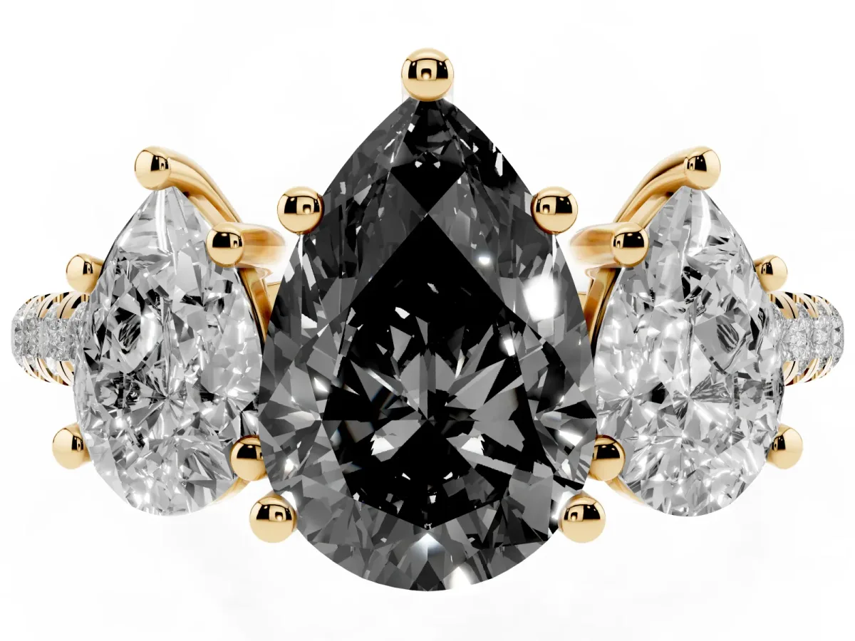 Fancy Black Three-Stone Pear Cut Diamond Ring with Round Pavé Band and Prong Setting Yellow gold