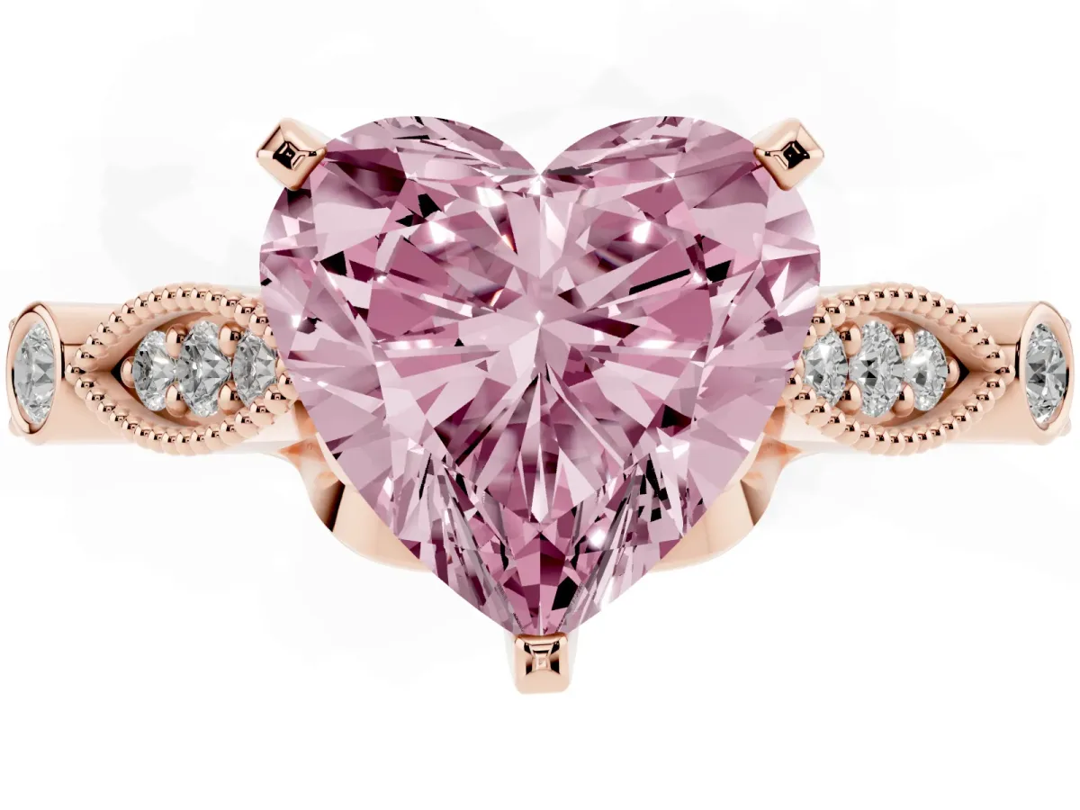 Fancy Pink Heart Cut Cut Diamond with Milgrain Marquise and Bezel Accents on a Solitaire Band with Prong Setting Rose gold
