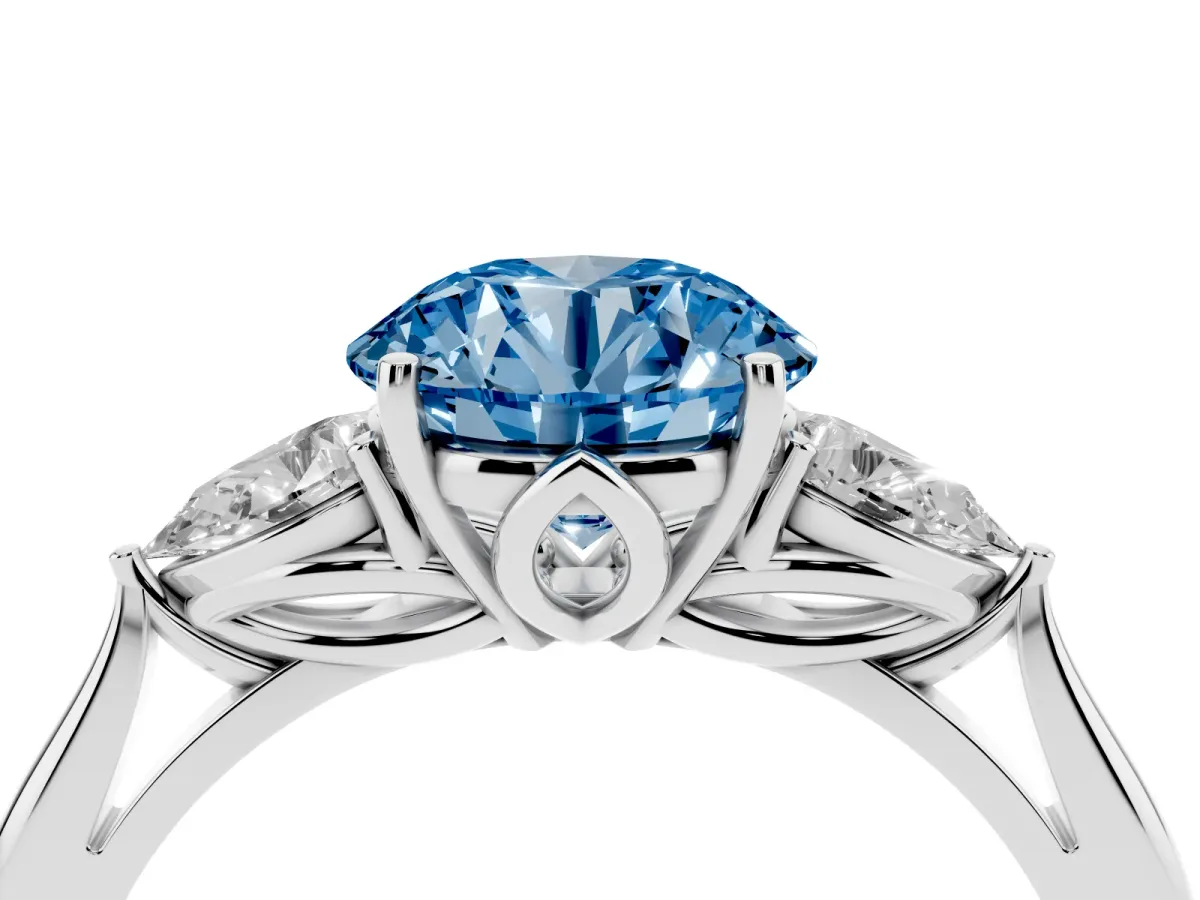 Fancy Blue Three-Stone Round Cut Brilliant Diamond Solitaire Ring with Tapered Band and Four-Prong Setting Platinum