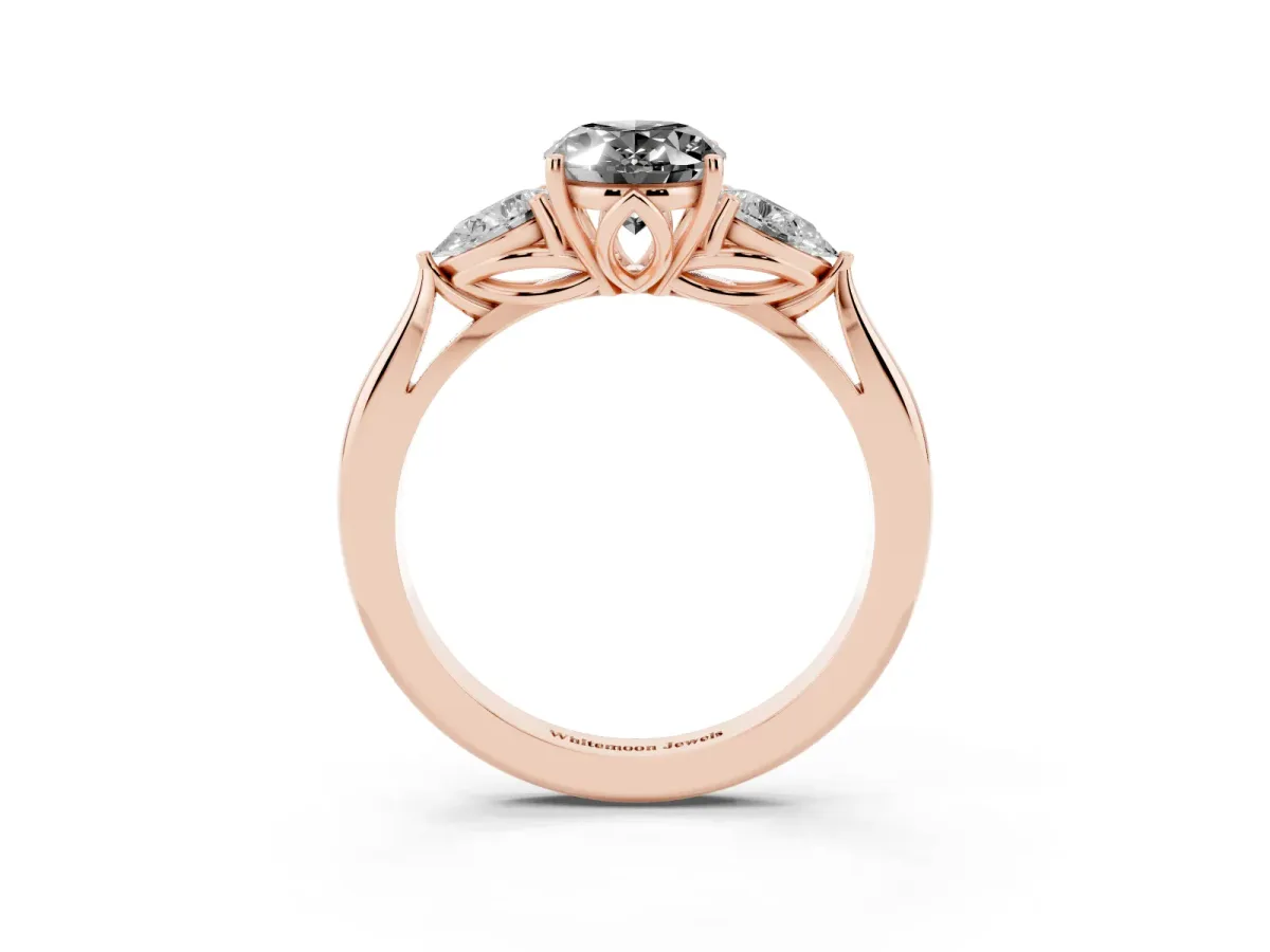 Fancy Black Oval Cut Diamond Three-Stone Ring with Pear Side Stones and Prong Setting Rose gold