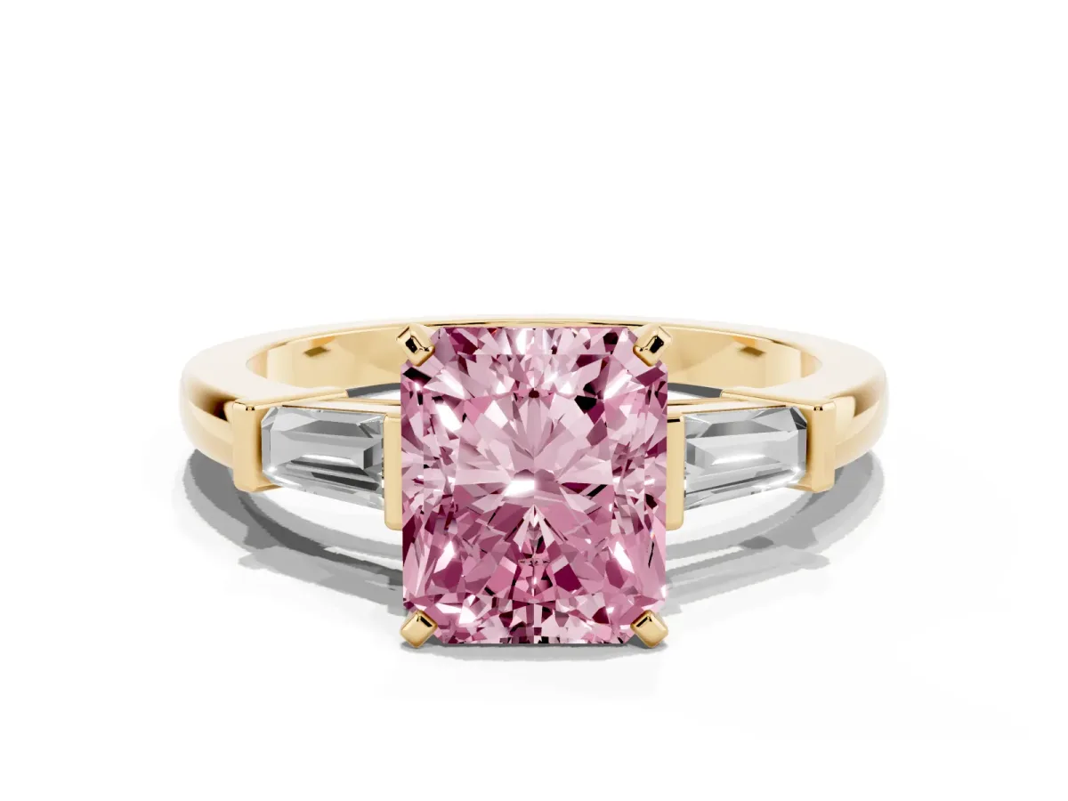 Fancy Pink Radiant Cut Cut Diamond Solitaire Ring with Tapered Baguette Accents and Four-Prong Setting Yellow gold