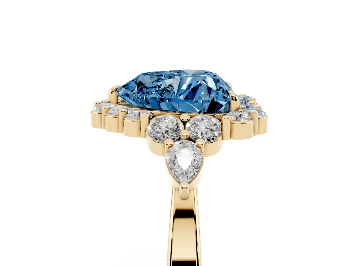 Fancy Blue Heart Cut Diamond Halo Ring with Pear Side Stones and Prong Setting Yellow gold